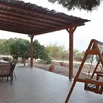 Flora's And Pool In Syros *