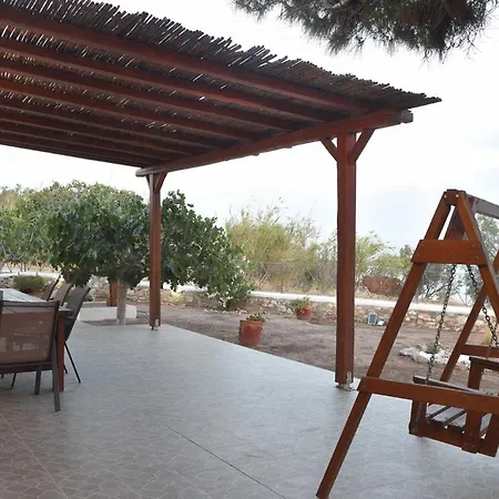 Flora's And Pool In Syros *