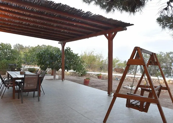 Flora's And Pool In Syros *